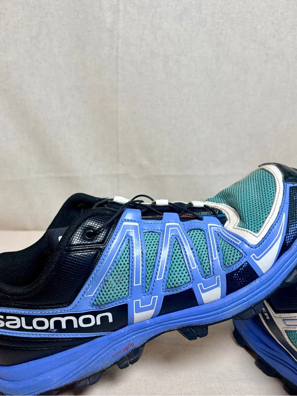 Salomon woman’s Sneakers in Teal, Blue, White and Black size 10